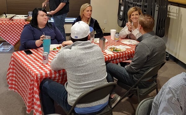 employees connecting at company lunch